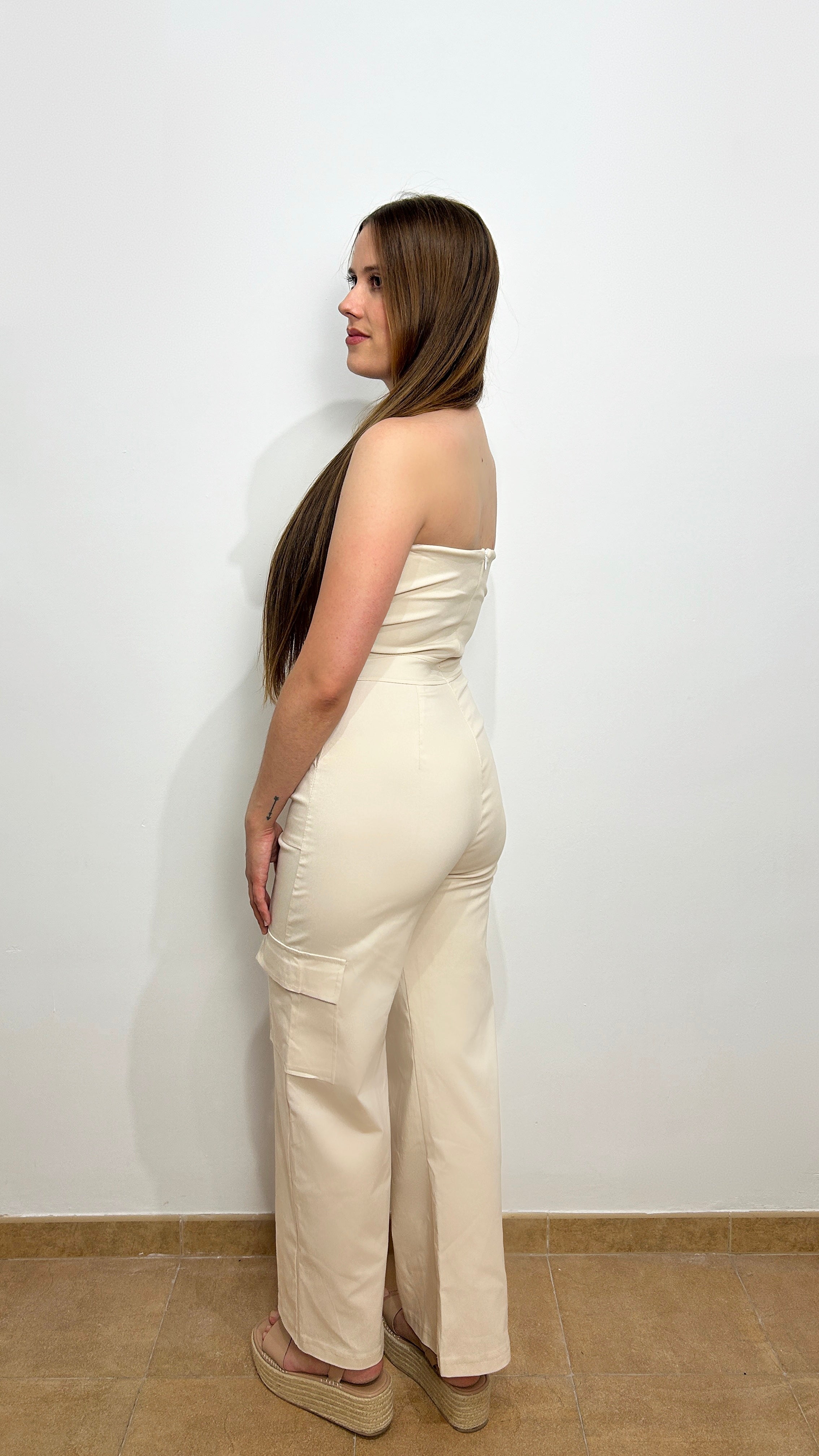 Tuta in denim beige con parola