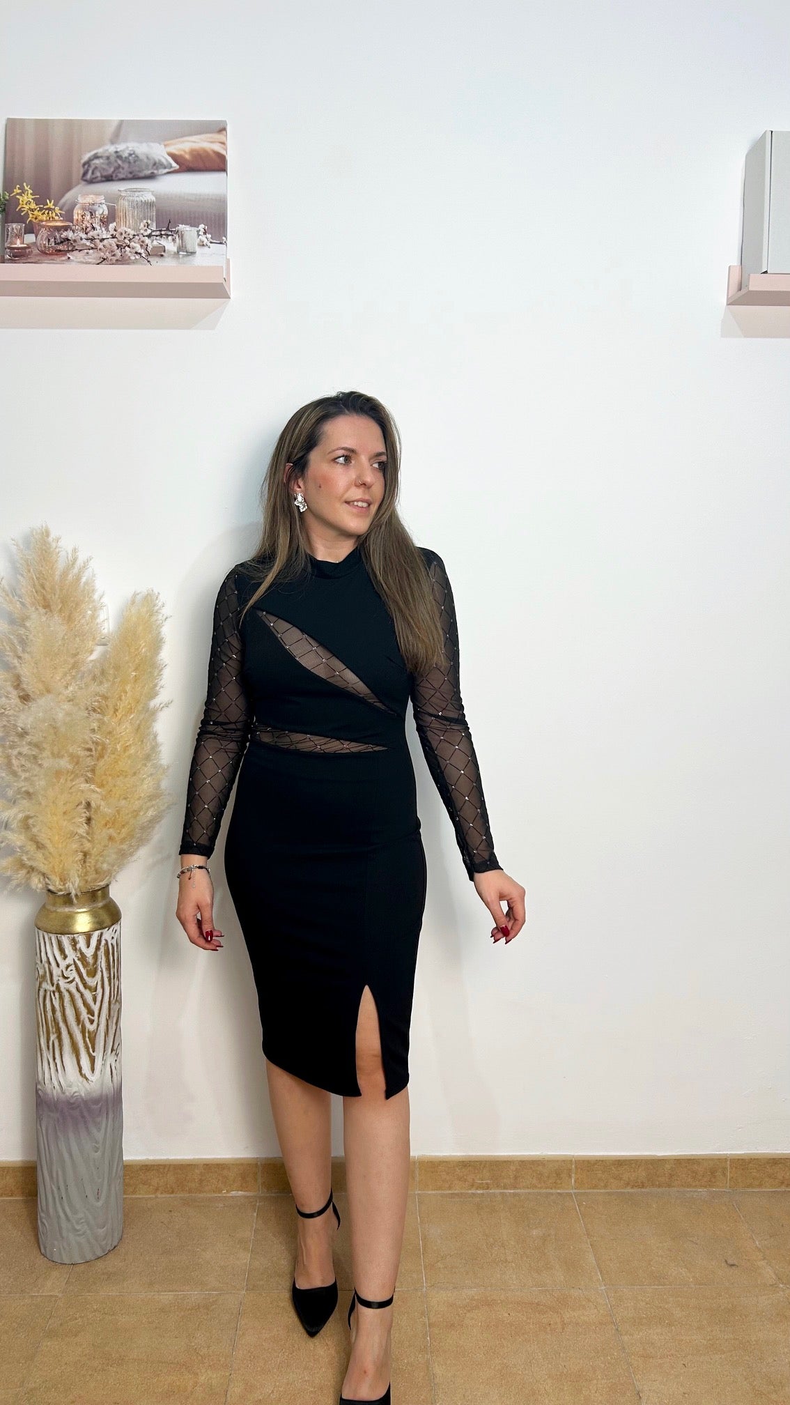 Abito nero con trasparenze glitterate