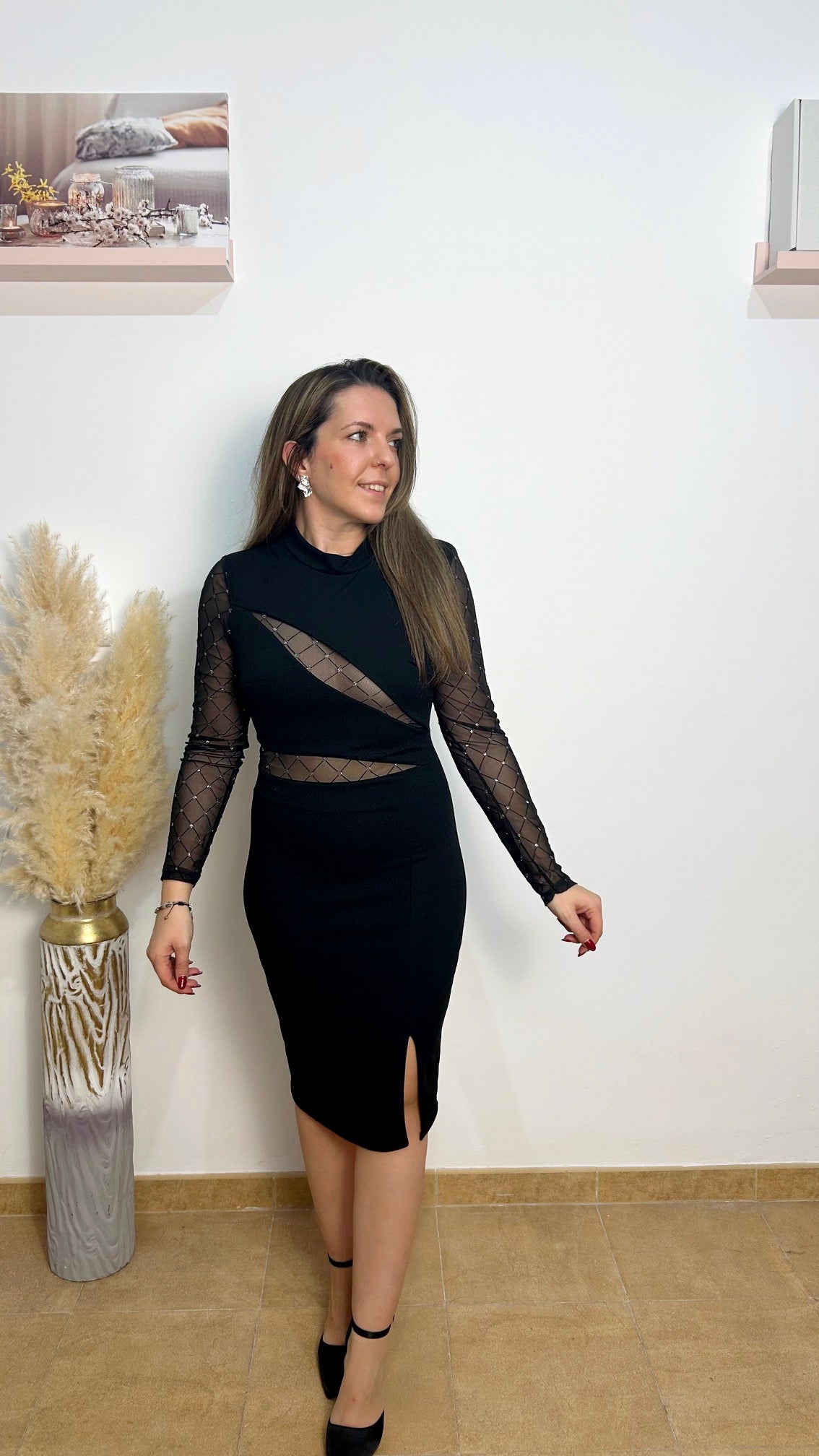 Abito nero con trasparenze glitterate