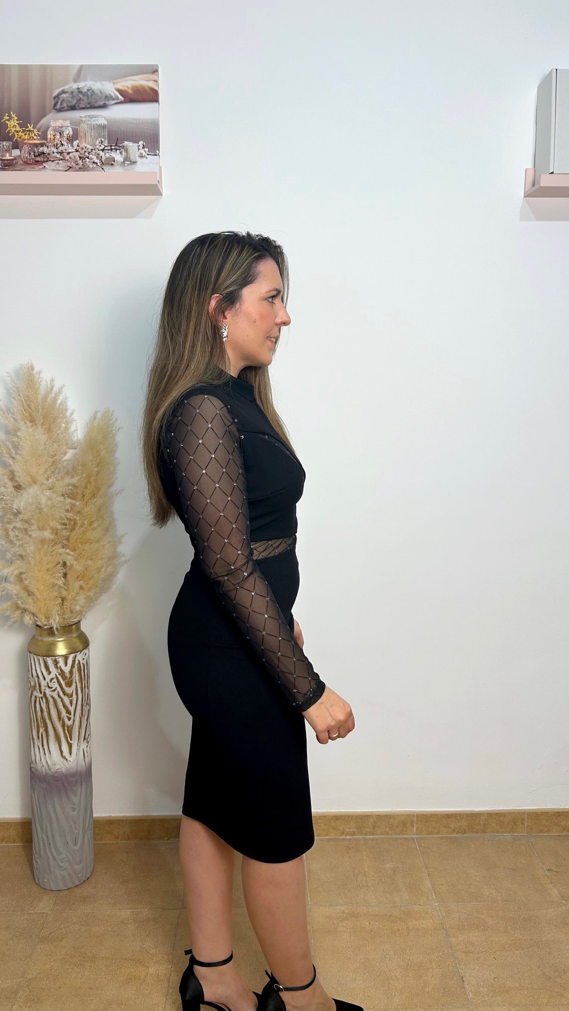 Abito nero con trasparenze glitterate