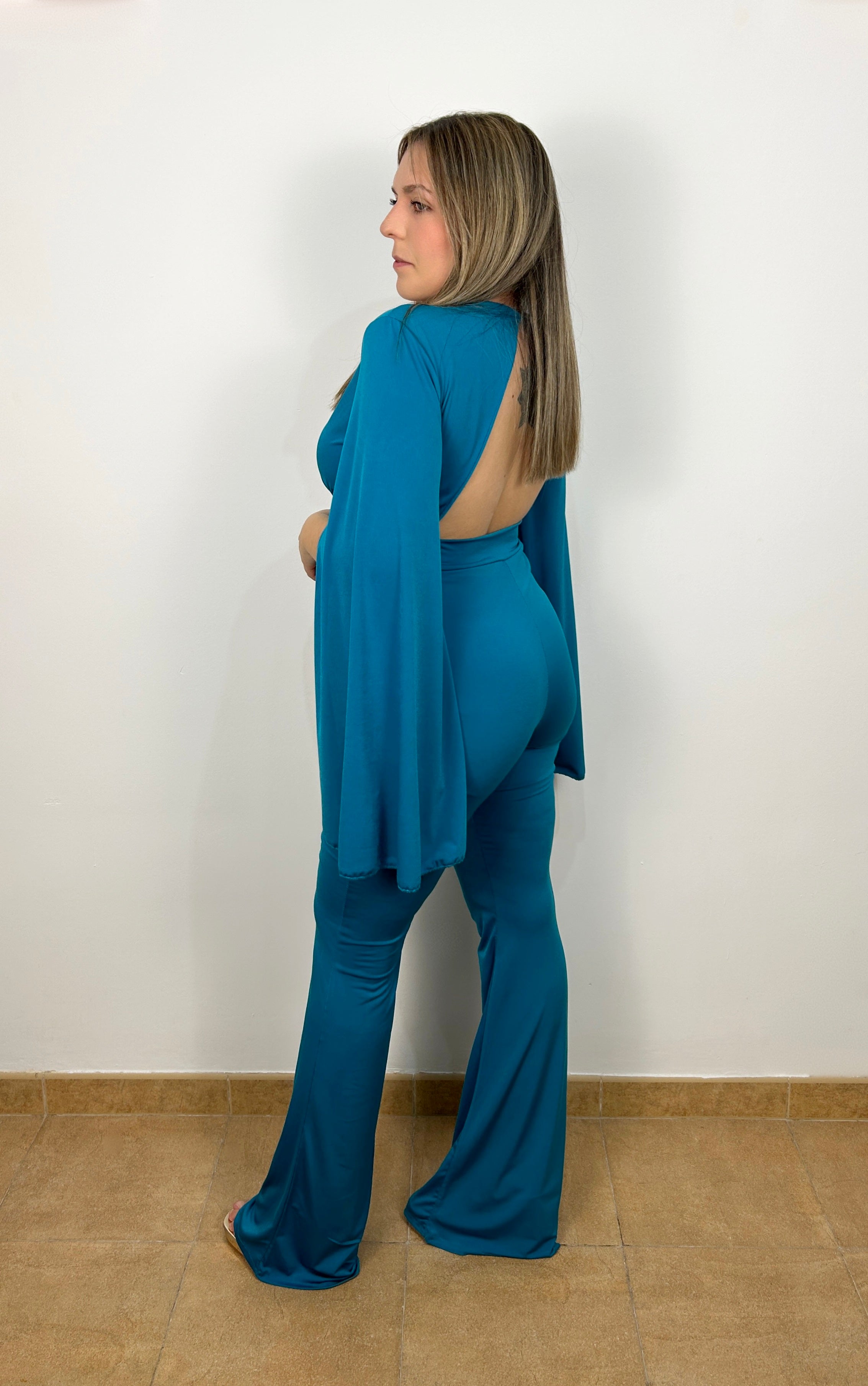 Tuta svasata color petrolio