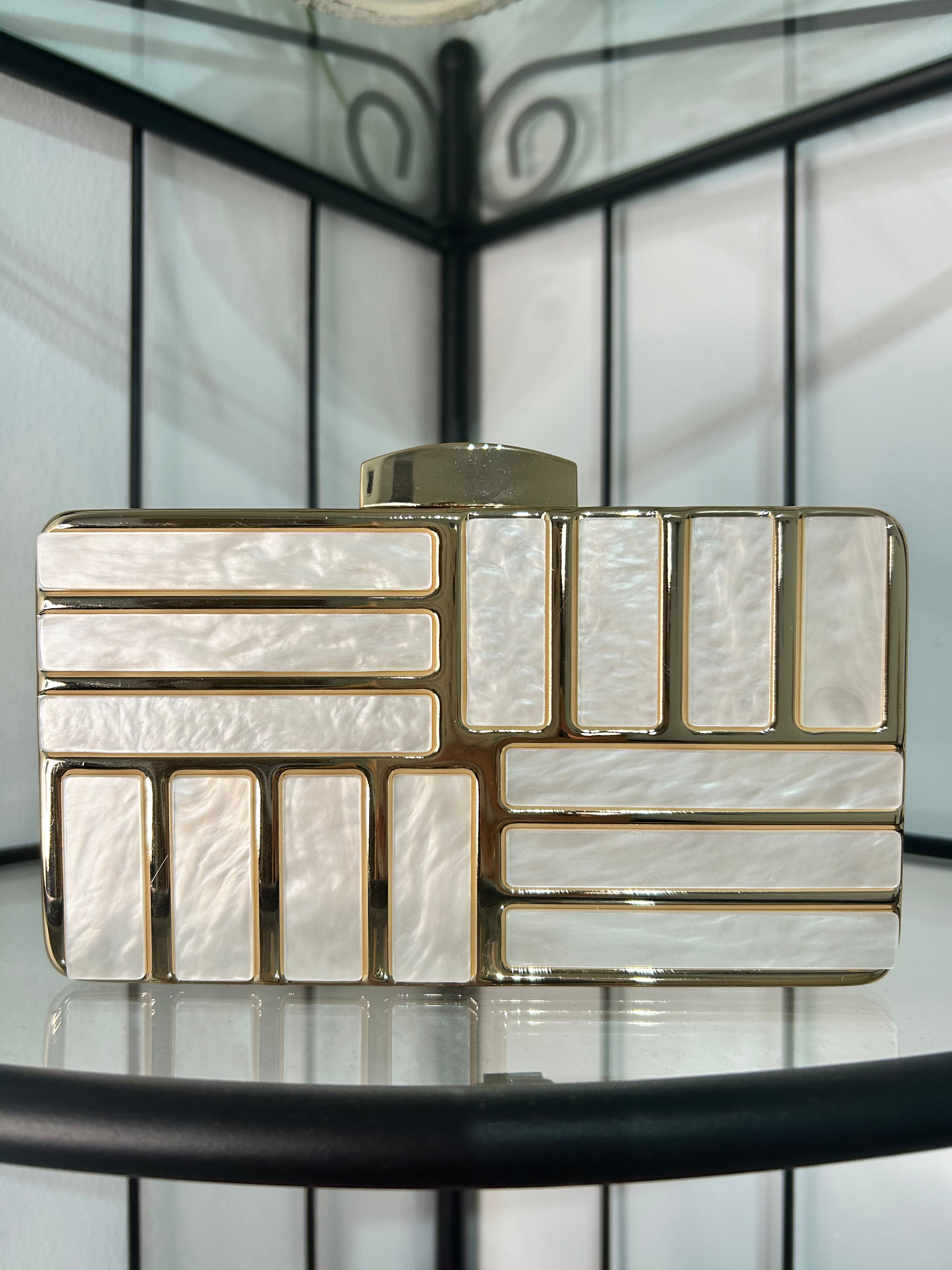 Pochette effetto marmo dorato